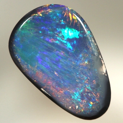 SOLID BLACK OPAL Bright reds over blues